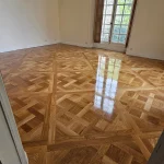 Quel est le coût de pose d&rsquo;un parquet de Versailles par un parqueteur professionnel?